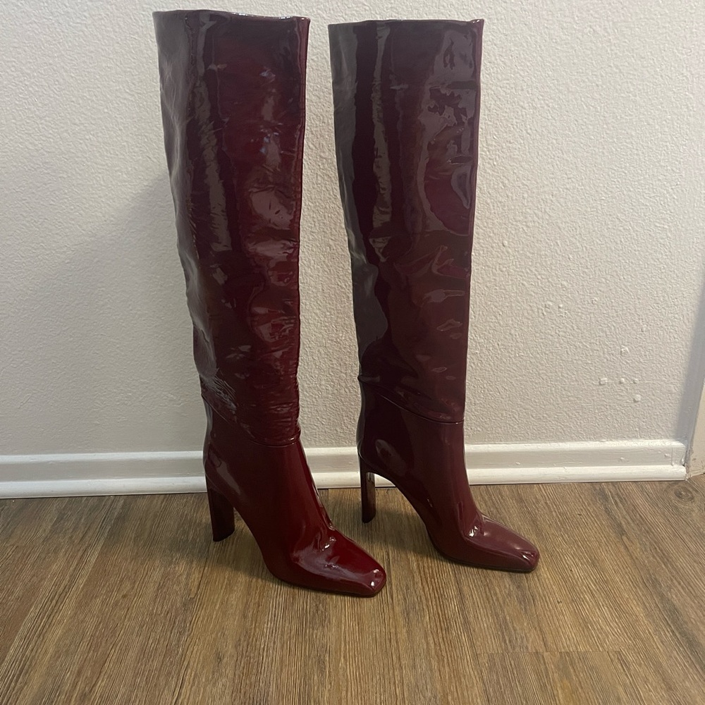 Tamara Mellon burgundy, knee-high boots in Trend. Never worn perfect condition